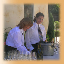 staff serving wine and beverages